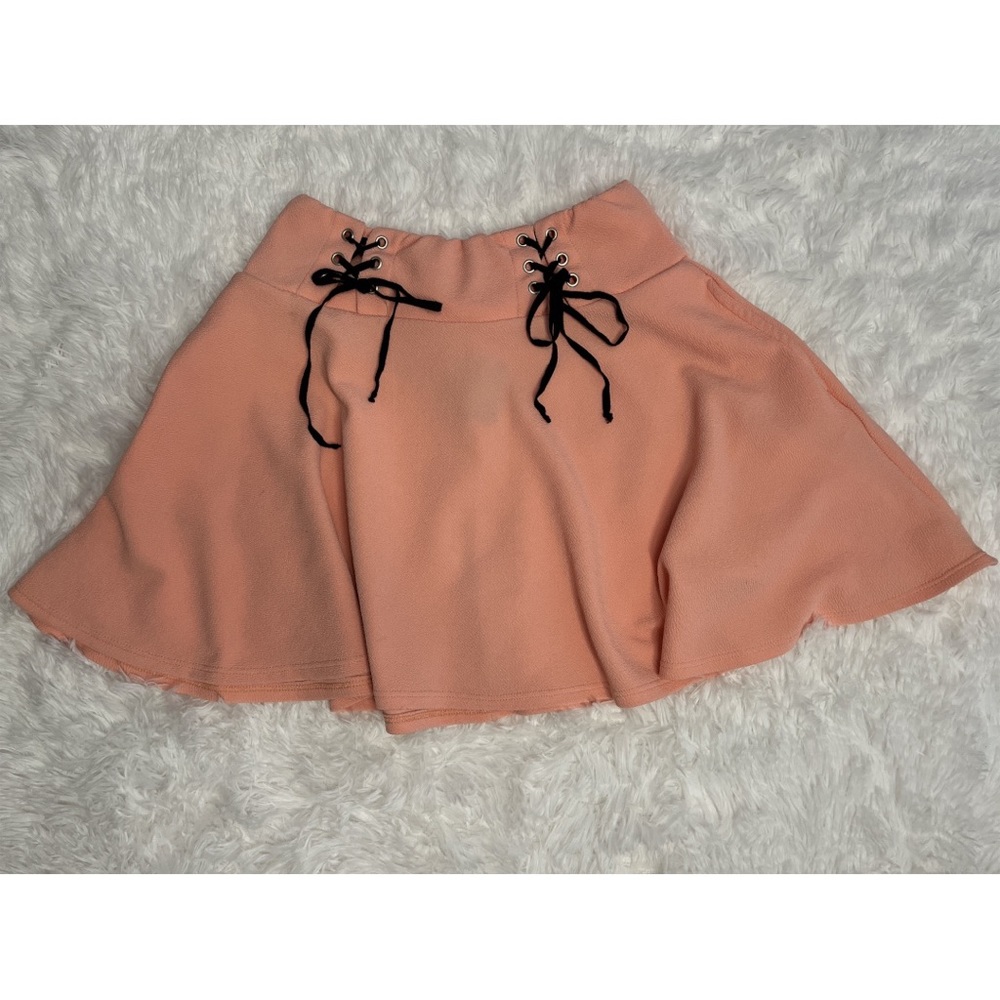 Hot Topic pastel pink lace up skater skirt size large.